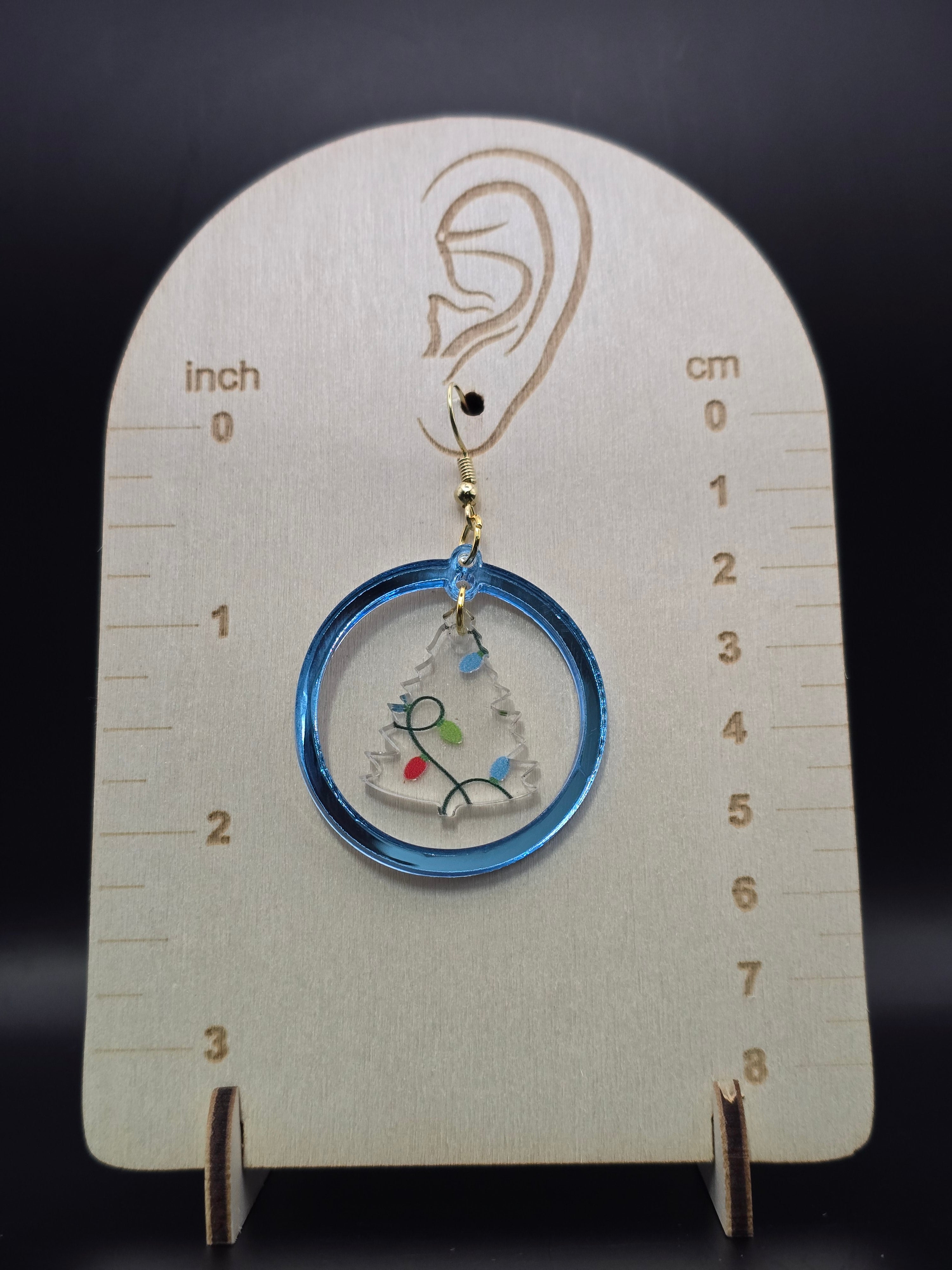 Circle with snowflake or tree earring